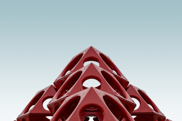 low-angle-red-geometrical-structure-blue-sky